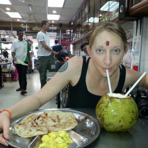 taken after I received a blessing from a Hindu priest at a temple that was located high up, deep in a cave in Malaysia